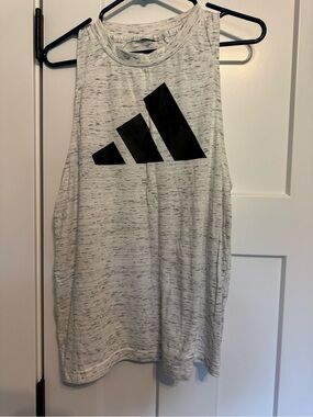 Adidas Tank atop